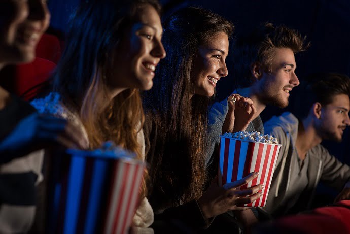 Group,Of,Teenager,Friends,At,The,Cinema,Watching,A,Movie Group,Of,Teenager,Friends,At,The,Cinema,Watching,A,Movie
